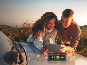 AMPROAD car jump starter charging laptop